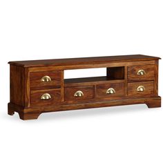 a wooden entertainment center with drawers and brass knobs