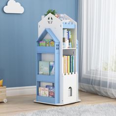 a white book shelf with books on it in a child's room, next to a window