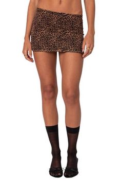 Leopard spots add major flirty appeal to this mesh miniskirt detailed with a dainty bow at the waist. Pull-on style 95% polyester, 5% spandex Machine wash, dry flat Imported Mesh Mini Skirt For Spring, Fitted Mesh Skirt Bottoms, Mesh Mini Skirt For Night Out, Fitted Mesh Mini Skirt For Summer, Fitted Mesh Mini Skirt, Fitted Mesh Mini Skirt For Night Out, Fitted Mesh Mini Length Bottoms, Summer Mesh Mini Skirt, Flirty Stretch Mini Skirt