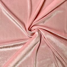 a close up view of a pink fabric