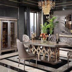 an elegant dining room with black walls and marble flooring