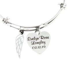 "Personalized Memorial Bracelet, Memorial Gift, Sympathy Gift for Her, Remembrance Jewelry, Loss of Loved One, Silver Angel Wing Bracelet This is laser engraved into high quality heavy gauge stainless steel. Each Heart Pendant Measures approx. 7/8\" Details for Bracelet: * Stainless Steel Bangle * ONE - 7/8\" Stainless Steel Round Disc with Name & Date or wording of your choice * Silver Angel Wing Other metal color options can be chosen ( Silver, Gold, Rose Gold) How to order: 1. Add this it Spiritual Heart Bracelet For Valentine's Day Gift, Adjustable Engraved Heart Bracelet Gift, Spiritual Heart Bracelet With Heart Charm For Gift, Spiritual Heart Charm Bracelet For Gift, Spiritual Heart Bracelet With Charm As Gift, Silver Engraved Bracelet For Memorials, Engraved Silver Bracelet For Memorial, Memorial Engraved Silver Bracelets, Silver Engraved Bracelet For Memorial