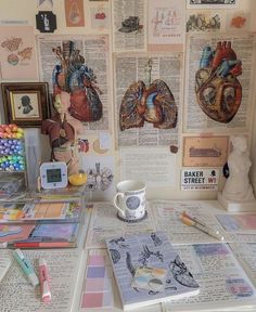 there are many different medical items on the table with markers, pens and pencils