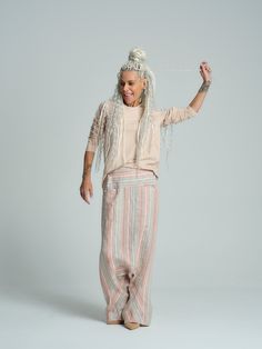 Embrace bohemian chic with this piece, featuring a serene pastel palette and relaxed low-crotch fit for effortless chill vibes. FEATURES:Drop-crotch pants with functional pockets. Please note that this is a pull-on piece with no closures.100% Handmade. SIZE & FIT:Fit: Relaxed fit with room to moveThe model is wearing size Small or S/MView our SIZE CHART before ordering MATERIALS & CARE:Content: 50% Cotton, 50% LinenCare: Machine wash on cold (30ºC) with a mild detergent. SHIPPING:Made to order, the processing time is 15 working daysThis item will be shipped via DHL Drop Crotch Pants, Chill Vibes, Pastel Palette, Beige Top, Skirt Jumpsuit, Bohemian Chic, Striped Linen, Handmade Products, Skirt Pants