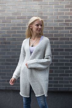 Alpaca oversized  chunky knit woman cardigan. Soft Texture Everyday Winter Cardigan, Oversized Gray Winter Cardigan, Gray Oversized Cozy Sweater, Oversized Soft Knit Cardigan, Long Gray Knitted Sweater Coat, Gray Long Knitted Sweater Coat, Oversized Gray Knitted Outerwear, Oversized Knitted Gray Cardigan, Oversized Soft Knit Cozy Cardigan