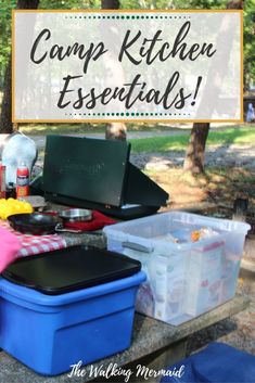 camping kitchen essentials on a picnic table with text overlay that reads camp kitchen essentials