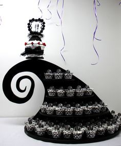 a black and white dress made out of balloons