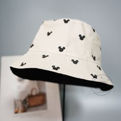 Personalized Mouse Ears Cartoon Bucket Hats ✿Size: 56-58cm ✿Material: polyester and cotton -High quality: lovely hand woven hat made of high quality polyester and cotton, making the hat soft and comfortable. It is comfortable and skin friendly for everyday wear. -Great accessories-suitable for daily wear, travel, shopping, photography. Foldable and packable, ready to carry. -Fashion: Our fashionable knitted hats use flower patterns, hollow hats, striped knitted hats and crochet knitting to make you more attractive. There is always an option for you. ✨This bucket hat can be used as a daily hat or a party dress. It is suitable for Halloween, Thanksgiving, Christmas, New Year, holidays, birthdays and other holidays. ✈️For shpping For most countries, it will arrive in 15-25 days. ✉After sales White Handmade Hats For Birthday, Casual Cotton Mickey Mouse Hats, Casual Cotton Hats With Mickey Mouse Detail, Fun Mickey Mouse Themed Hat One Size Fits Most, Cute White Bucket Hat With Curved Brim, Adjustable Mickey Mouse Fun Hat, Playful White Bucket Hat, Fun Mickey Mouse Hat, Cute White Bucket Hat, One Size