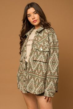 A unique and trendy addition to your outerwear collection. This shacket features an eye-catching Aztec print that adds a touch of bohemian flair to your look. The 3D front pockets provide both style and functionality, while the button closure adds a classic touch. Model SpecsHeight: 5'10"Bust: 33"Waist: 23.5"Hips: 35" Style: Casual Print / Pattern: Aztec Silhouette: Shacket Fit: Relaxed Embellishment: 3D Pockets Neck Line: Collar Sleeve: Long sleeve Length: Up to 35" Closure: Button Lining: No M Aztec Silhouette, Red Wine Dress, 3d Pocket, Aztec Shirt, Wine Red Dress, Wine Dress, Bold Dresses, Christmas Party Dress, Aztec Pattern