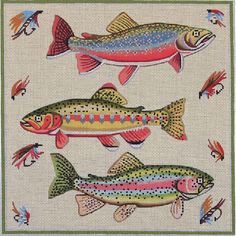 three fish cross stitch pattern on a white background with green trimmings and red, yellow, blue, pink, orange