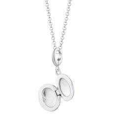 A true classic this tiny celestial locket adds understated elegance to your jewellery collection. A pleasingly smooth oval shaped locket that reflects the light for a high-quality mirror-like shine, it features superb craftsmanship with a stunning starry cosmic scene etched on the front. Crafted from sterling silver this locket opens up you to reveal a 10x6mm section for you to insert your own pictures or to hold a tiny treasure.  All our charms attach with a clip-on clasp and are compatible wit Elegant Silver Oval Charm Necklaces, Elegant Charm Necklace With Removable Round Pendant, Elegant White Gold Oval Link Locket Necklace, Elegant Round Locket Necklace With Charms, Silver Locket Necklace With Charms And Oval Pendant, Silver Oval Pendant Locket Necklace With Charms, Elegant White Gold Round Pendant Locket Necklace, Silver Minimalist Locket Charm Necklace, Silver Dainty Locket Necklace With Round Pendant