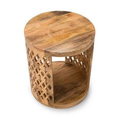 a small wooden table with holes in the middle and an intricate design on it's side