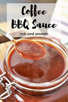 coffee bbq sauce in a glass jar with a spoon on top and the words, coffee bbq sauce rich and smooth