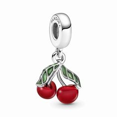 Add this cherry charm to your look for a vibrant pop of color. Crafted in sterling silver, this fruity dangle charm features a pair of ripe red cherries with detailed green leaves hand-finished in transparent enamel. Wear it alone or style it with other fruit charms to turn your favorite Pandora pieces into a medley of delectable, collectible sweet summer fruits. Charms Disney, Charms Pandora, Cherry Fruit, Bracelet Pandora, Red Cherry, Pandora Bracelet Charms, Pandora Bracelets, Dangle Charms, Pandora Bracelet