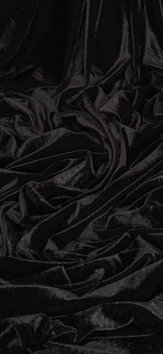 an image of black fabric that looks like it has been dyed into something dark color