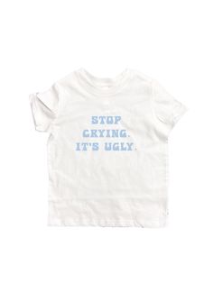 "a white, soft, stretchy 100% cotton t-shirt with the quote \"STOP CRYING. IT'S UGLY.\" each of our shirts has a real quote given to us by someone who has been personally victimized by a flamingo boi (sometimes slightly reworded but still very real) when buying leave us a quote with something a flamingo boi has said to you and you might have the chance to be featured on our next drop! *please be aware this a baby-tee shirt and will fit like a crop top.* sizes are unisex!" Cotton Tops With Graphic Print, Inspirational White Tops With Text Print, Inspirational Cotton Tops With Quote Print, Inspirational Cotton Tops With Funny Text, White Cotton Top With Quote Print, White Cotton Tops With Quote Print, White Cotton Tops With Funny Text, Funny Cotton Tops With Quote Print, Unisex White Tops With Funny Text