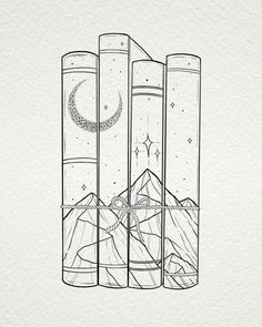 three candles with the moon and stars in them on top of each other, surrounded by mountains