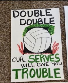 two signs on the floor that say, double double our serves will give you trouble