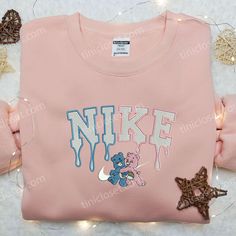 Cheer & Grumpy Bear x Nike Embroidered Shirt, Nike Embroidered Shirt, Cartoon Care Bear Embroidered Shirt Spongebob Embroidery, Nike Inspired, Iconic Cartoon, Sweatshirt Ideas, Grumpy Bear, The Spongebob, Custom Sweaters