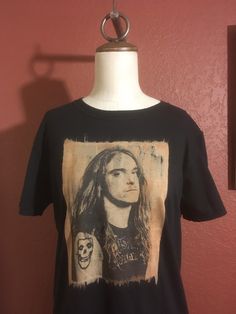 a t - shirt with an image of a woman's face on it