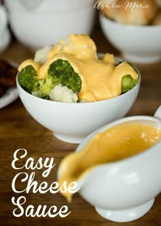 a white bowl filled with broccoli covered in cheese sauce next to other bowls