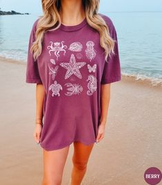 Under the Sea Comfort Colors Sea Animals Summer Beach Vacation Shirt,ocean Tshirt for Her,marine Life Shirt,ocean Inspired Shirt,beach Gifts - Etsy Purple Short Sleeve Vacation Tops, Purple Short Sleeve Beach Top, Purple Short Sleeve Top For Vacation, Casual Ocean Color Beach Tops, Casual Ocean Color Tops For Beach, Pre-shrunk Graphic Tee For Beach, Graphic Tee Tops For Beach, Surfing Beachwear Tops For Beach Season, Beachwear Tops For Surfing During Beach Season