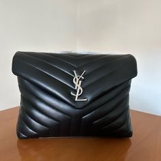 Saint Laurent Medium Lou Lou Bag In Black Shiny Leather With Silver Hardware The Bag Is Unused And Comes With Wrapping On The Handles. Sold With Dustbag Authentic Size : Dimensions: 32 X 22 X 12 Cm / 12.6 X 8.7 X 4.7 Inches Strap Drop: Doubled 26 Cm / 10.2 Inches, Single 48 Cm / 18.9 Inches We Are Selling For Our Business Luxuryconfession Perfect Bag, Black Silver, Dust Bag, Saint Laurent, Shop My, Bag Lady, Shoulder Bag, 10 Things, Leather