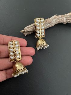 This Unique pair of Earrings is designed and crafted at PraNiCollectioNs  PraNiCollectioNs is the place for anyone who Is in lookout for a latest trend with an ethnic touch.  We at PraNiCollectioNs offers a great range of Indian Ethnic jewellery's. We are strongly committed to  Prasoviding our customers  some uniquely handcrafted Produs with utmost satisfaction. These jewellery's are made from high quality  material which are Hypoallergenic and are also free from corrosion and rusting This listi Festive Brass Jhumkas, Bollywood Brass Earrings As Gift, Gift Brass Jhumkas With Latkans, Brass Jhumkas For Diwali Gift, Brass Jhumkas Gift For Diwali, Bollywood Style Bridal Brass Earrings, Handmade Jhumkas For Ceremonial Diwali, Brass Jhumkas For Festival Gifts, Diwali Gift Jhumkas For Pierced Ears