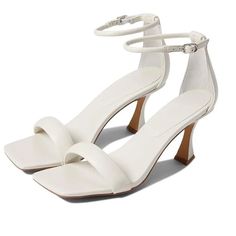 Barely There Kitten Heel White Single Strap Ankle Strap White Strappy Synthetic Heels, White Synthetic Strap Heels, Chic White Strap Sandals, White Strappy Heels With Buckle Closure, Cream Ankle-high Summer Heels, White Sandals With Ankle Strap, White Fitted Sandals With Heel Strap, White Ankle-high Sandals For Summer, White Strappy Heels For Spring