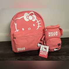 Brand New Bundle Of : -Hello Kitty Backpack Measurement Approx : 11.5” X 9.5” X 5.5” -Hello Kitty Phone Crossbody Bag Measurement Approx : 7” X 4.5” Trendy Hello Kitty Print Bag For Back To School, Trendy Hello Kitty Print Back To School Bag, Trendy Hello Kitty School Bag, Pink Hello Kitty Print Standard Backpack, Pink Hello Kitty Print Backpack, Trendy Hello Kitty Back To School Bag, Hello Kitty Print School Backpack, Travel Bags With Cat Design For Back To School, Travel Bag With Cat Design For Back To School