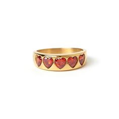 There are no other words for our newest sparkling ring of the season other than J'adore. With glistening red hearts contrasted by a classic gold band, the J'adore Ring is one you will love for ever! 14k Gold Plated (1 Micron Plating)  Stainless Steel Base  Coloured Zircon Stones  E-coating for a premium finish  Lead & Nickel Free  Tarnish Resistant Red Heart Ring, Red Accessories, Ring Heart, Sparkling Rings, Jewelry Lookbook, Red Hearts, Jewelry Ring Box, Classic Gold, Affordable Jewelry