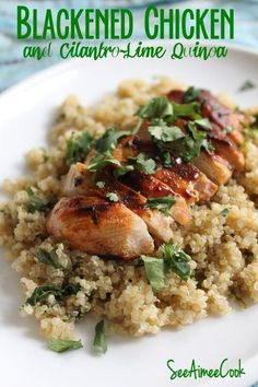 chicken and cilantro - lime quinoa is served on a white plate