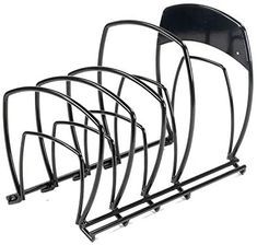 three black metal bike racks on a white background