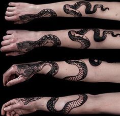 three black tattoos on both arms and feet, one with a snake in the middle