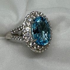 Captivating Swiss Blue Topaz With A Double Halo Of Beautiful Zircons Set In Platinum Over Sterling Silver. I Saw A Very Similar Ring With Only 5 Ctw At Zales Set In Sterling Silver Only On Sale Last Week For $179.00. This Ring Is 10.65 Ctw And Has Platinum Over The Sterling Silver. Stunning!!!! Nwot, Happy Poshing!!!!! Luxury Blue Topaz Ring With Vs Clarity, Dazzling Blue Topaz Ring For Formal Occasions, Blue Topaz Ring For Formal Events, Double Halo, Swiss Blue Topaz, Fairy Tale, Blue Topaz, I Saw, Topaz