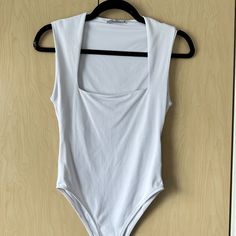 Stretchy Square Neck Bodysuit With Clips. Full Coverage Bottom. Never Worn. Trendy Fitted Zara Bodysuit, Trendy Sleeveless Zara Bodysuit, Trendy Zara Sleeveless Bodysuit, Zara Trendy Sleeveless Bodysuit, Zara Summer Stretch Bodysuit, Zara White Fitted Bodysuit, Square Neck Bodysuit, Zara White, Zara Tops