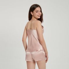 100% 19 Momme Mulberry Silk (High Grade 6A) Thread Count:400 Fashionable V-neck design Size:XS, S, M, L, XL Color: Charming Pink Silky,Comfortable,Anti-Allergic,Skin-Friendly THXSILK's matching pajama camisole set is the most stylish and lightweight out there, and the camisole pairing is really very much and hot sleeper. The silk fabric feels luxurious and the overall fit is casual, so you won't get hooked up if you wear it for any length of time. The stitching and structure of the neckline of t Casual Pink Sleep Tank Top, Chic Pink V-neck Sleepwear, Feminine Camisole Top, Chic V-neck Sleep Camisole, Pink Sleeveless Camisole For Loungewear, Pink Sleeveless Sleep Camisole, Feminine V-neck Camisole For Loungewear, Solid V-neck Sleepwear For Spring, Pink Camisole For Loungewear