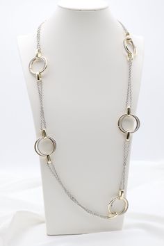 This Gold & Silver Cable Floating Dig Circle Double Belcher Necklace is expertly crafted and designed to elevate any look. Made from high-quality gold and silver, this necklace features a unique floating dig circle design and a double belcher chain for a modern and luxurious touch. A must-have for any jewelry collection. Length: 36 inches Circle: 1.13” Width Closure: Lobster Claw Material: Brass with 18K Gold Plating and Rhodium Coating Lead Free and Hypoallergenic Belcher Chain, Circle Design, Tennis Bracelet, Gold And Silver, Gold Plating, Lobster Claw, Silver Gold, Jewelry Collection, Floating