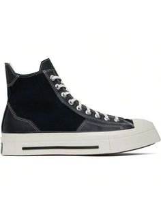 Converse 
Black Chuck 70 De Luxe Squared Sneakers 
High-top canvas and grained faux-leather sneakers in black. 
. Square rubber cap toe 
. Lace-up closure 
. Logo patch at inner side 
. Eyelets at inner side 
. Pull-tab at heel 
. Cushioned Ortholite® footbed 
. Rubberized logo patch at sculptural midsole 
. Treaded rubber sole 
. Contrast stitching in white 
Supplier color: Black/Black/Egret 
Upper: textile, synthetic. Sole: rubber. 
Made in Viet Nam. 
242799M236014 
Black Chuck 70 De Luxe Squa Streetwear Canvas Shoes With Rubber Heel Cap, High-top Leather Canvas Shoes With Contrast Sole, Black Canvas Shoes With Rubber Toe Cap For Sports, Streetwear Canvas Shoes With Rubber Toe Cap, Canvas Shoes With Rubber Toe Cap For Streetwear, Urban Lace-up Canvas Shoes With Rubber Toe Cap, Canvas Shoes With Rubber Toe Cap For Sports, Black Leather Canvas Shoes With Contrast Sole, Sports Canvas Shoes With Rubber Toe Cap