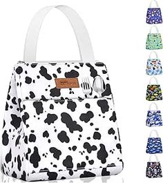 a white and black cow print lunch bag with six different colored spots on the side