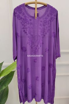 DESCRIPTION Kurti Fabric: Modal Cotton Wash Care : Hand Washable Sleeves: 3/4 Sleeves Kurti Length :44-46 inches Style: Ethnic Wear Occassion: Party Wear, Wedding Wear Package Contains : Only Kurti Traditional Purple Kaftan For Festive Occasions, Chikankari Embroidery Saree Kaftan For Diwali, Purple Straight Kurta For Summer, Festive Kurta With 3/4 Sleeve For Eid, Festive 3/4 Sleeve Kurta For Eid, Summer Purple Straight Kurta, Festive Purple Tunic Dress, Long Sleeve Dresses With Chikankari Embroidery For Diwali, Long Sleeve Chikankari Embroidered Dresses For Diwali