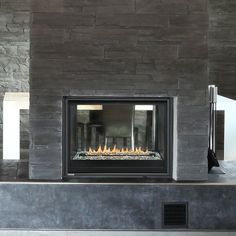 a modern fireplace in the middle of a room with a sign that reads, model shown