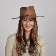 The Aspen Wide Brim Felt Fedora Hat is here to make a statement. This rancher-style hat is the perfect rustic piece to sport for your days in the great outdoors. Spice up any look with our unique braided leather matchstick band and wide smooth brim. Featuring a sewn-in sweatband with a unique hidden pull strap tightening system for a one of a kind fit! Plus we’ll include two adhesive size reducers for an even more custom experience. American Hat Makers, Womens Fedora, Wide Brim Fedora, Felt Fedora, Beach Hat, Fedora Hat, Braided Leather, Summer Hats, Great Outdoors