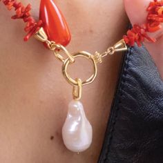 Baroque means ‘irregularly shaped’ and like our luxuriant earrings - there is nothing regular about your beauty! This minimalist piece needs nothing other than your gorgeous spirit to charm ‘em all! Elegant Freeform Natural Stones Necklace, Modern Baroque Pearl Jewelry As Gift, Elegant Coral Jewelry With Pearl Drop, Chic Teardrop Jewelry Gift, Coral Pearl Drop Jewelry Gift, Coral Pearl Drop Jewelry As Gift, Elegant Freeform Necklace For Gifts, Elegant Baroque Pearl Jewelry, Chic Handmade Teardrop Jewelry