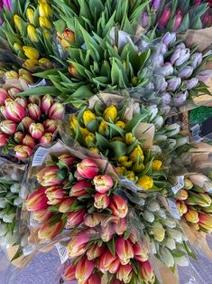 a bunch of flowers that are sitting on a table