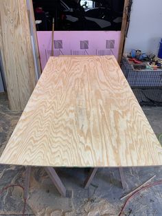 the table is being built and ready to be used as a dining room or office