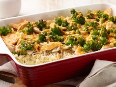 a casserole dish with chicken, broccoli and rice