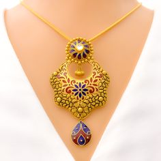 Make a statement with our Iconic Floral Meenakari Pendant Set. Crafted from 22k gold with an oxidized finish, this set boasts intricate meenakari work and stunning kundan stones. The pendant measures 2.9" in length, while the matching earrings are 2.25" long, both with screw back posts. With a weight of 39.9 grams, this set is a must-have for any fashion-forward individual. PRODUCT DETAILS Gold Purity(karat): 22k Item Weight(grams): 39.9 Item Finish: Oxidized Stone: Kundan Pendant Length: 2.9" M Dual-tone Kundan Chandbali Temple Necklace, Dual-tone Chandbali Kundan Temple Necklace, Gold Plated Meenakari Temple Necklace In Chandbali Shape, Gold Plated Meenakari Temple Necklace In Chandbali Style, Gold Plated Meenakari Temple Necklace Chandbali, 22k Gold Chandbali Temple Necklace With Meenakari, Festive Dual-tone Kundan Chandbalis, Diwali Meenakari Temple Necklace Gold Plated, Gold Meenakari Kundan Necklace In 22k Gold