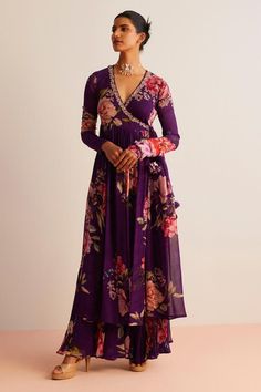 Purple full sleeve angrakha anarkali with floral print and tassel detailing. Paired with a gathered floral print pant.
Components: 2
Pattern: Print
Type Of Work: Floral
Neckline: V Neck
Sleeve Type: Full Sleeves
Fabric: Viscose Georgette
Color: Purple
Other Details: 
Model height:  5 ft 9 inches, wearing size S
Length:
Angrakha Length - 50 inches
Pant Length - 42 inches
Occasion: Sangeet - Aza Fashions Angrakha Style Anarkali, Angrakha Anarkali, Angrakha Dress, Designer Anarkali Dresses, Angrakha Style, Trendy Outfits Indian, Dresses Traditional, Anarkali Dress Pattern, Print Pant