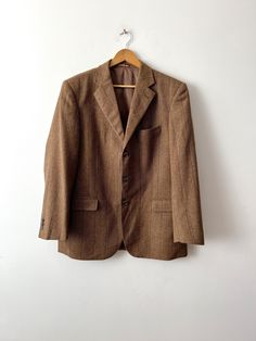 Vintage Brown striped Jacket Wool Sport Coat Men's Classic Retro Jacket  Ewidio Tucci wool Jacket Everyday Sports Coat Size Large Label size: 52 Measurements: (lying flat) Length:  30.5"/ 77.5 cm Sleeve:  24.5"/ 62 cm Shoulders : 19"/ 48 cm Pit to pit : 22.5"/ 57 cm Waist:  21.5"/ 54.5 cm Please check measurements to insure a proper fit. Remember to allow yourself some extra room for movement. You can compare these with something from your closet that fits you well. This jacket will come to you Retro Jacket, Sports Coat, Striped Jacket, Extra Room, Wool Jacket, Vintage Brown, Sport Coat, Mens Coats, Women's Blazer